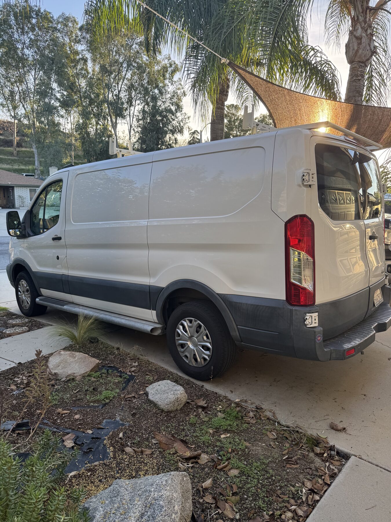 The Navarro Construction work van parked beside a home